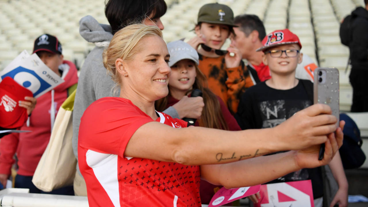Katherine Brunt takes a selfie with some fans after the game, England vs New Zealand, Commonwealth Games, Birmingham, August 4, 2022