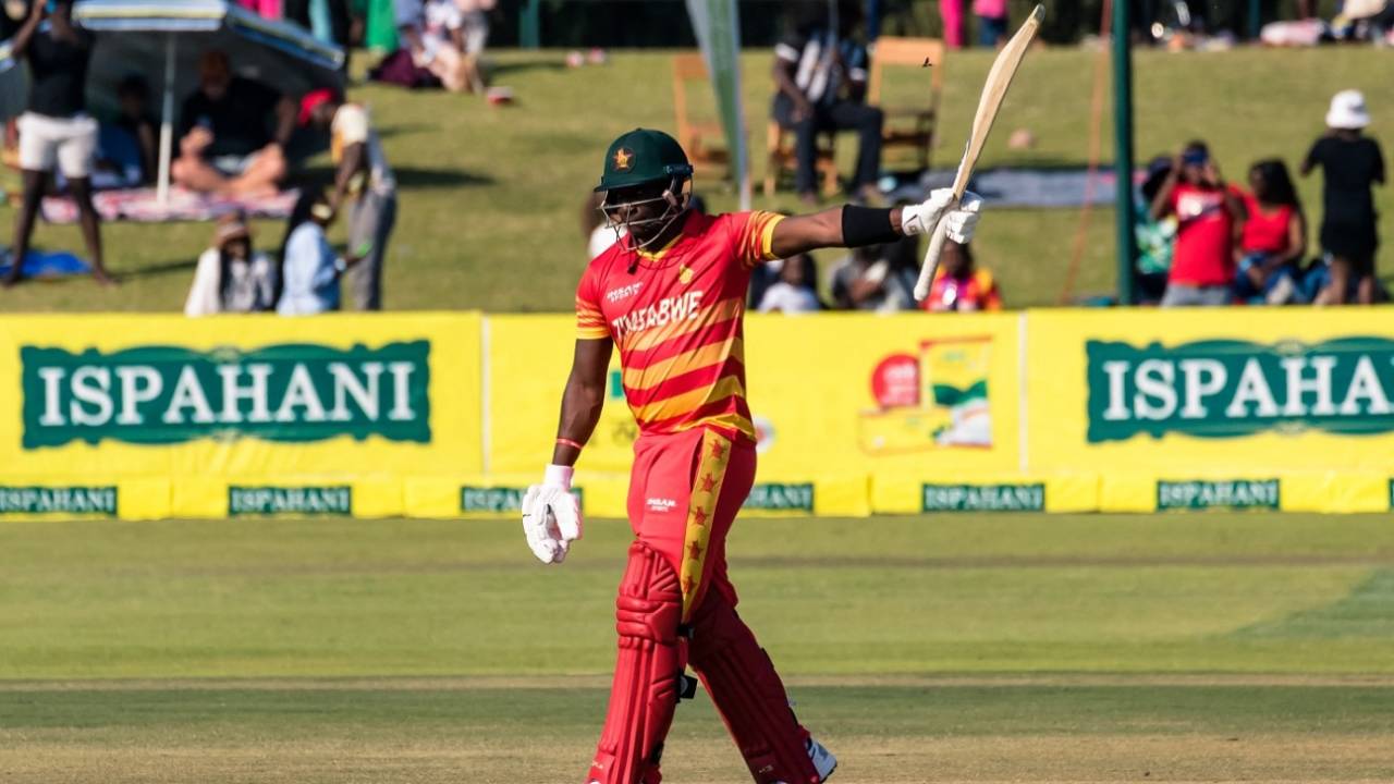 Innocent Kaia raises his bat after his half-century, Zimbabwe vs Bangladesh, 1st ODI, Harare, August 5, 2022