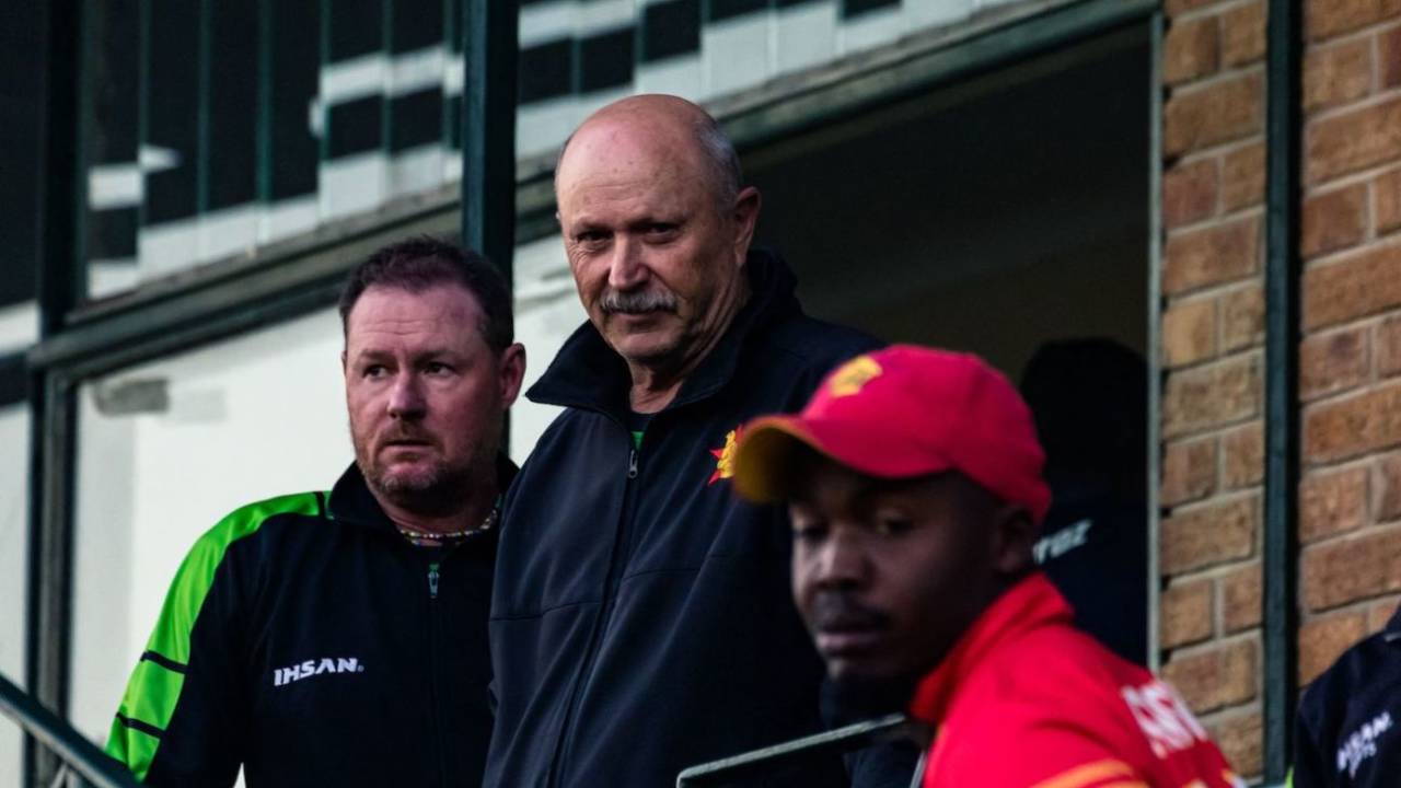 Zimbabwe head coach Dave Houghton and batting coach Lance Klusener watch proceedings after his team's series-sealing chase, Zimbabwe vs Bangladesh, 2nd ODI, Harare, August 7, 2022