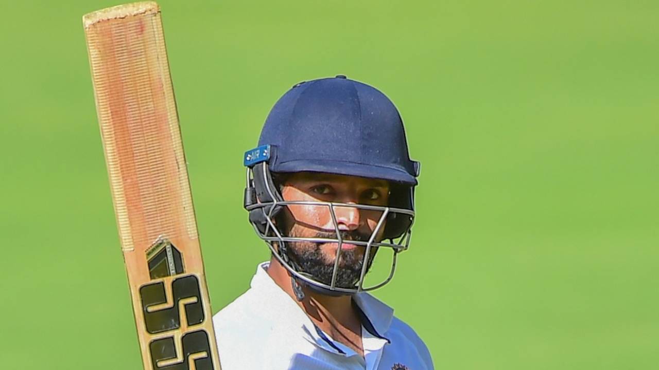 Rajat Patidar raises his bat as he walks back to the pavilion after India A declared, India A vs New Zealand A, 3rd unofficial Test, Bengaluru, 3rd day, September 17, 2022