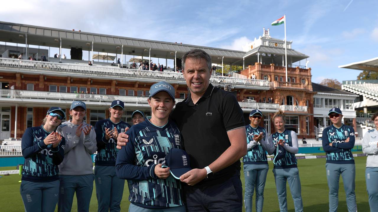 Tammy Beaumont receives her 100th ODI cap from Carl Crowe