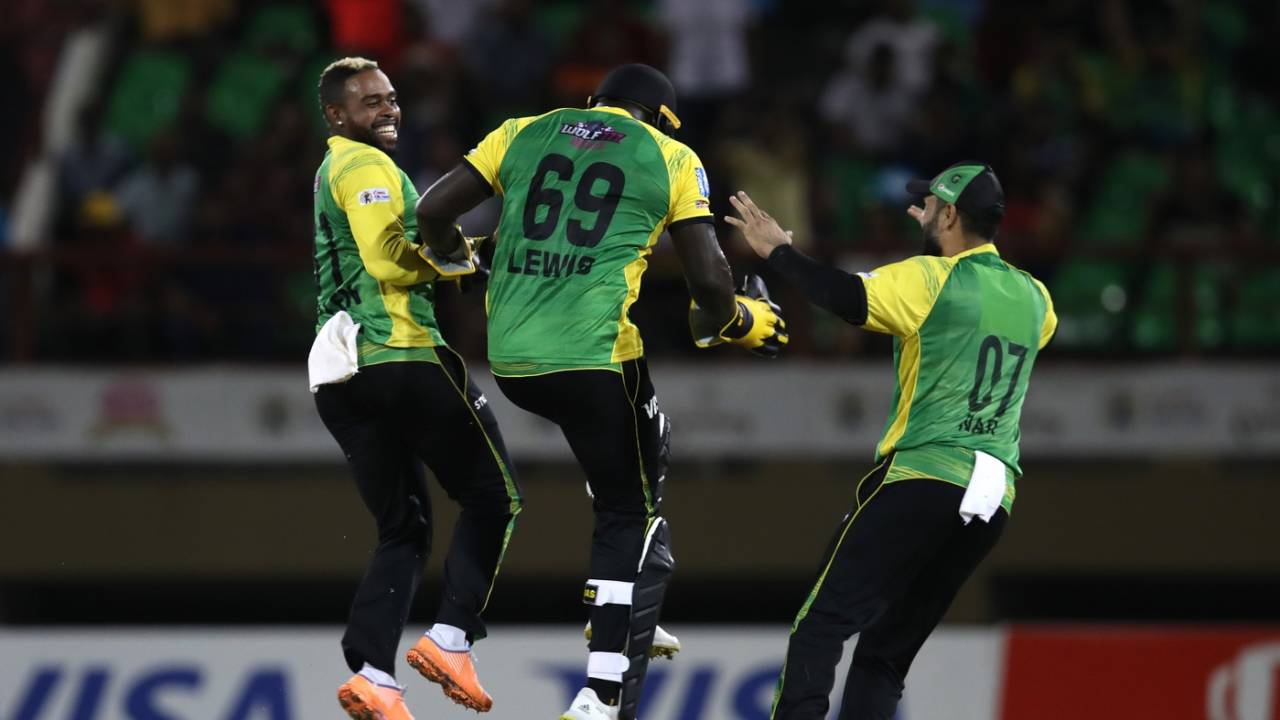 Fabian Allen, Kennar Lewis and Mohammad Nabi celebrate Faf du Plessis' wicket