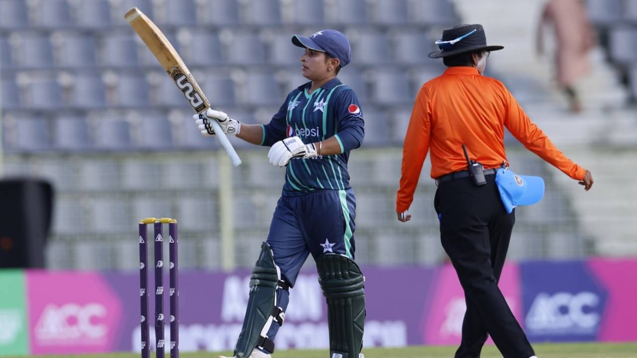 Nida Dar raises her bat after reaching her sixth T20I fifty, India vs Pakistan, Women's T20 Asia Cup, Sylhet, October 7, 2022
