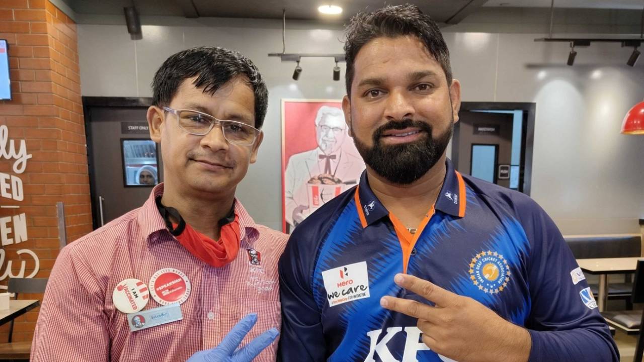 Indian deaf cricket team captain Virendra Singh (right) poses for a picture