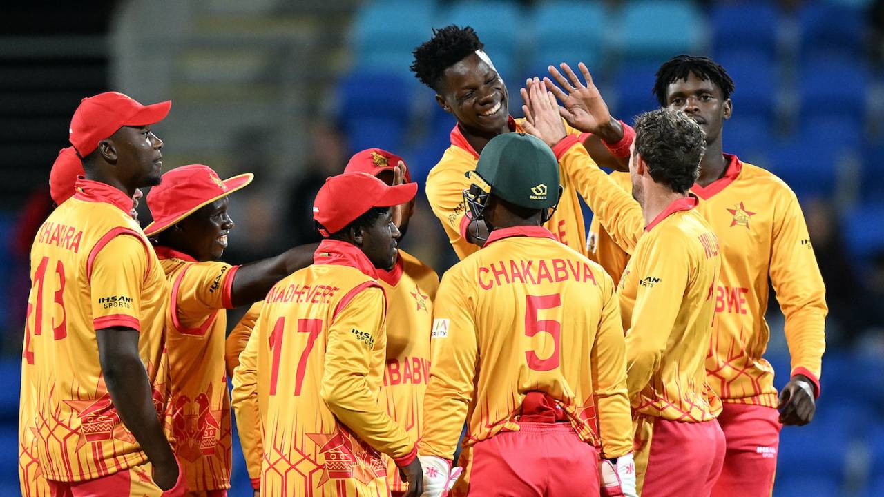 Zimbabwe's players celebrate after Johnson Charles' run out, West Indies vs Zimbabwe, ICC Men's T20 World Cup, Hobart, October 19, 2022
