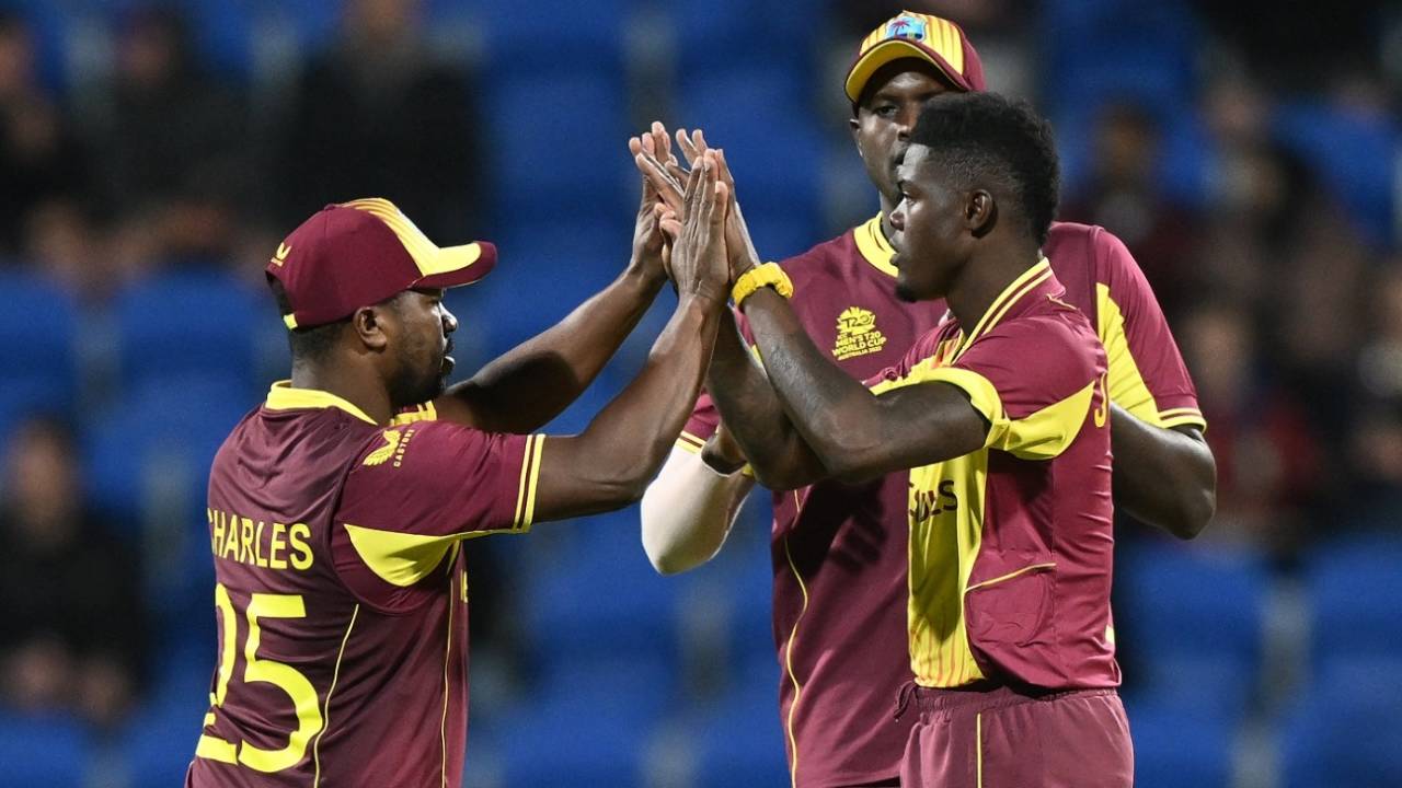 Alzarri Joseph celebrates with team-mates after getting Regis Chakabva, West Indies vs Zimbabwe, ICC Men's T20 World Cup, Hobart, October 19, 2022
