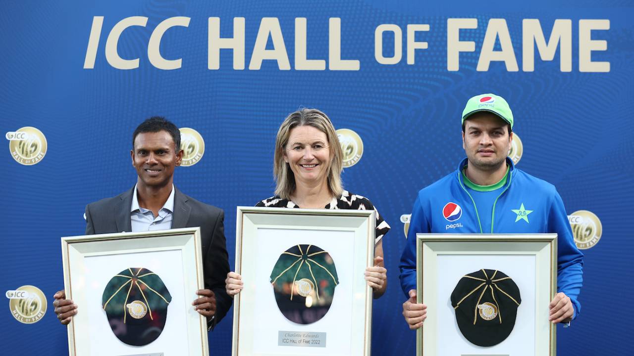 [L to R] Shivnarine Chanderpaul, Charlotte Edwards and the late Abdul Qadir's son Usman Qadir pose with the ICC Hall of Fame trophies