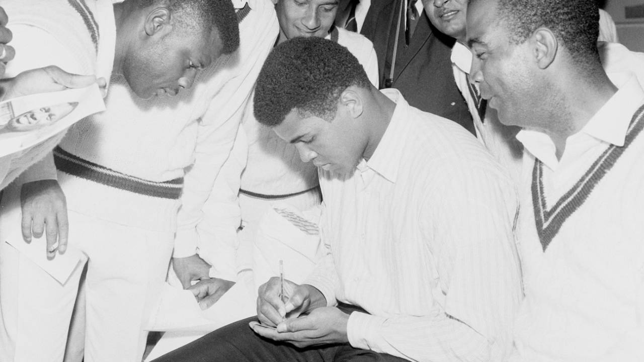 Muhammad Ali signs autographs for the West Indies players in the dressing room, England vs West Indies, Lord's, 1st day, June 16, 1966