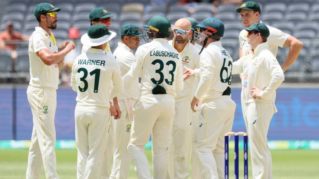 Nathan Lyon is mobbed by his team-mates after striking early on the final day, Australia vs West Indies, 1st Test, Perth, 5th day, December 4, 2022
