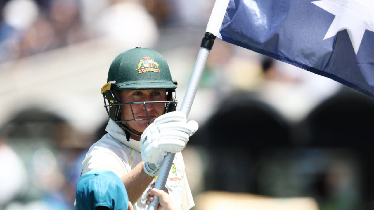 Marnus Labuschagne feels the Australian flag before going in to bat, Australia vs West Indies, 2nd Test, Adelaide, 2nd Day, December 9, 2022
