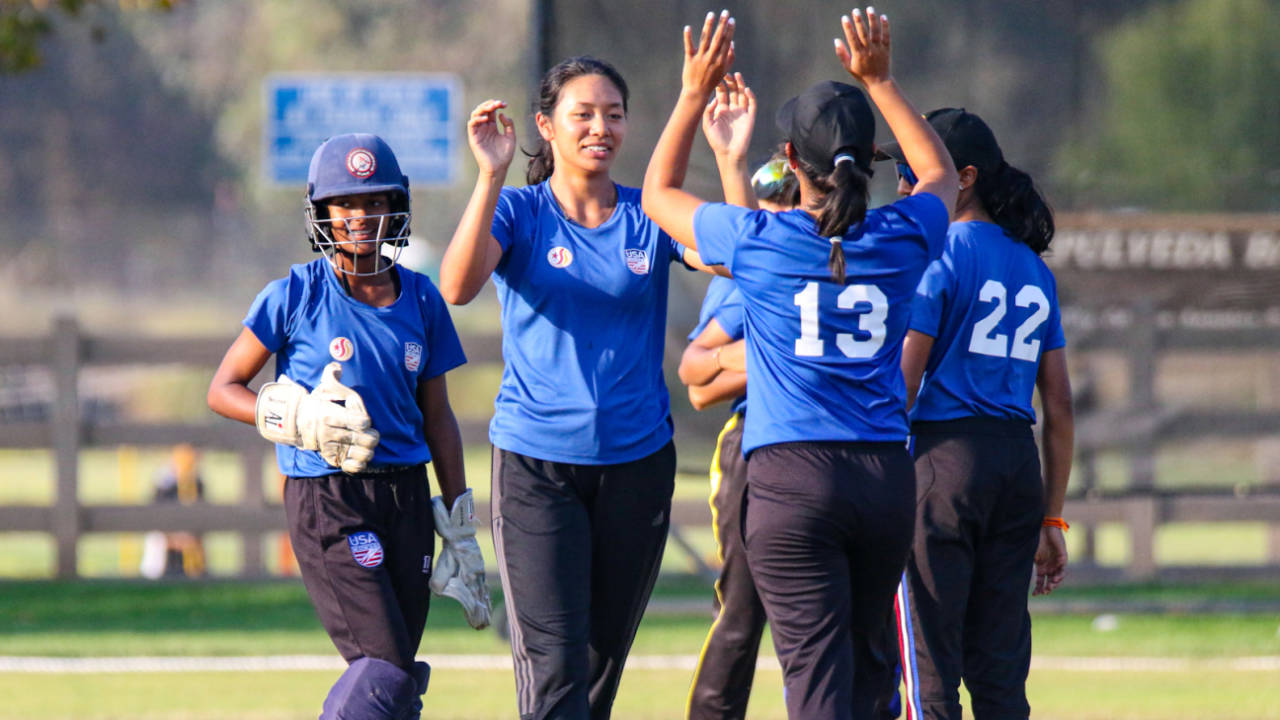 Medium pacer Jivana Aras gets a high five after taking a wicket at the 2022 USA Cricket Women's U19 National Championship, Los Angeles, October 11, 2022