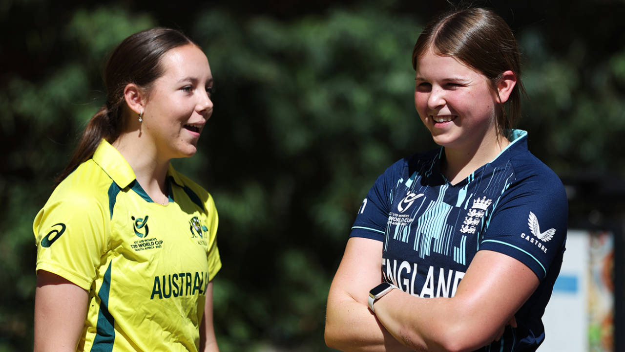 Rhys McKenna, captain of Australia, shares a laugh with Grace Scrivens&nbsp;&nbsp;&bull;&nbsp;&nbsp;ICC via Getty Images