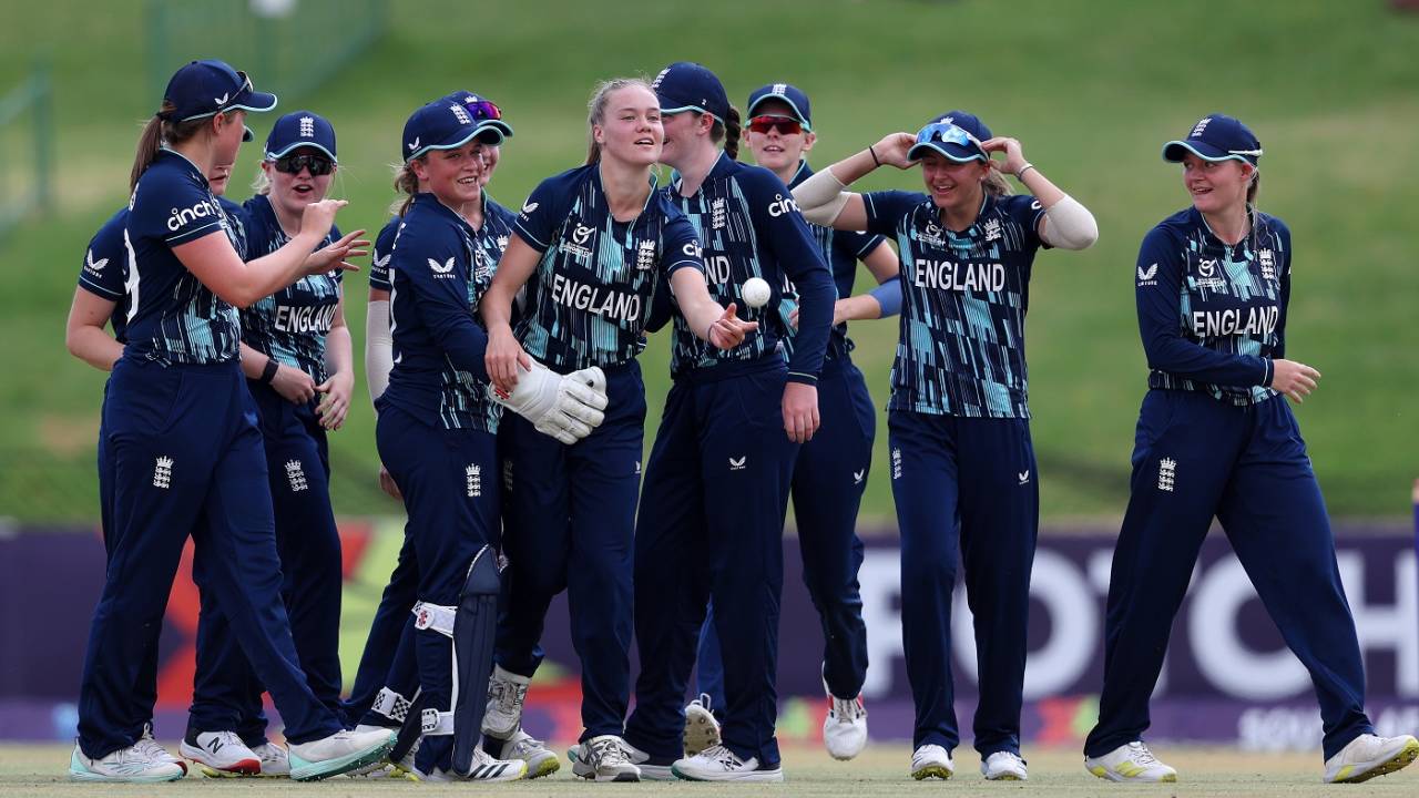 Alexa Stonehouse is hogged by her team-mates after she dismissed Sianna Ginger, Australia vs England, Under-19 Women's T20 World Cup, semi-final, Potchefstroom, January 27, 2023
