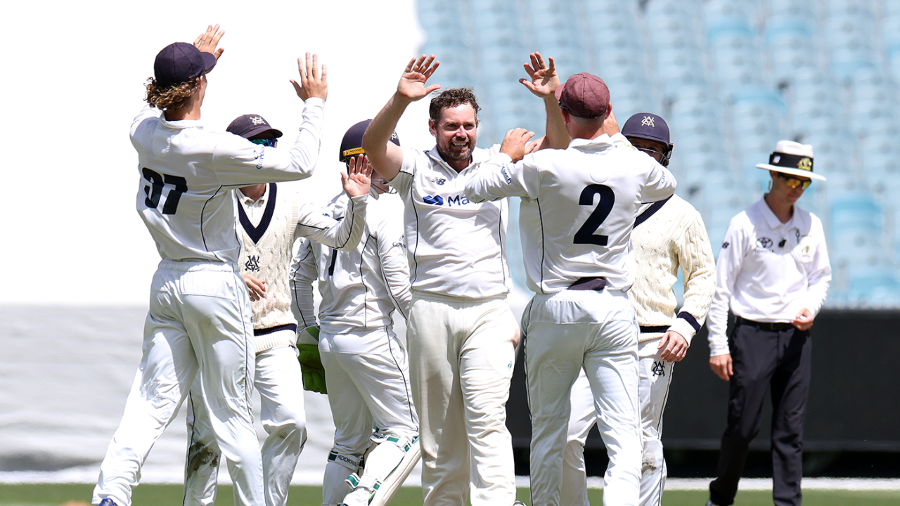 Victoria celebrate one of Jon Holland's final-day wickets