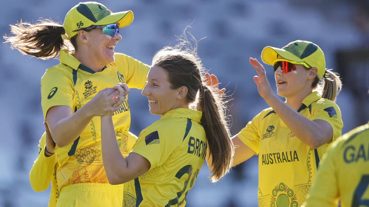 Darcie Brown celebrates with Grace Harris and Ellyse Perry, Australia vs India, Women's T20 World Cup, semi-final, Cape Town, February 23, 2023