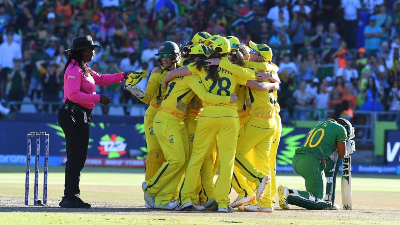 The Australian team celebrates after sealing victory, South Africa vs Australia, Women's T20 World Cup, Final, Cape Town, February 26, 2023