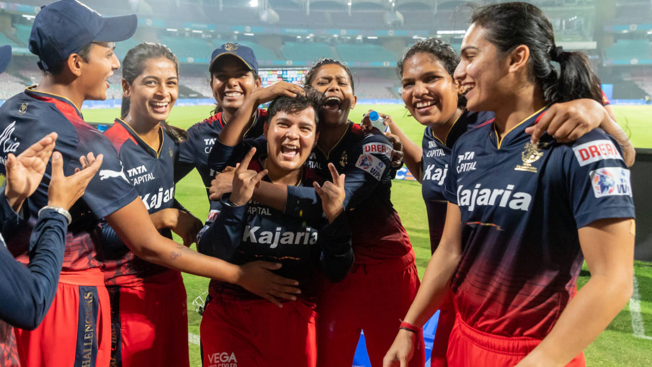 Kanika Ahuja celebrates with her team-mates after winning RCB the game, Royal Challengers Bangalore vs UP Warriorz, WPL, Navi Mumbai, March 15, 2023