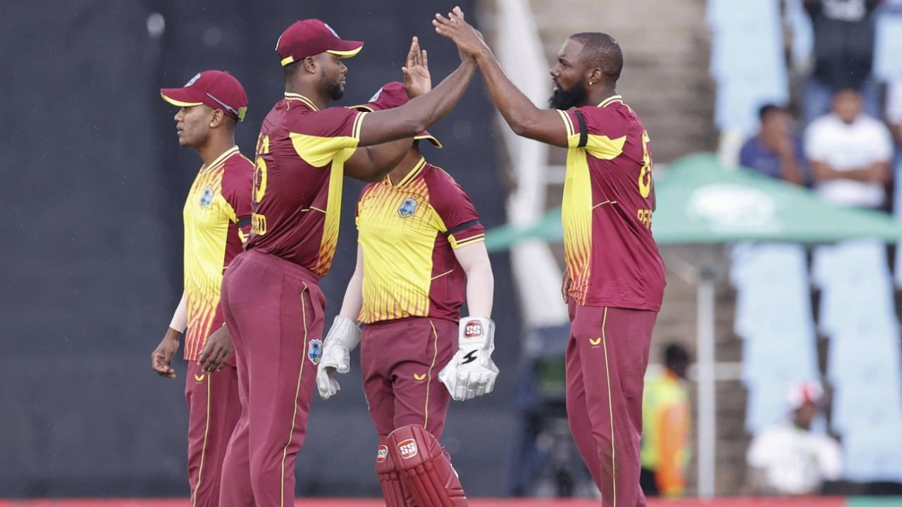 Raymon Reifer celebrates the wicket of Quinton de Kock with Romario Shepherd, South Africa vs West Indies, 2nd T20I, Centurion, March 26, 2023