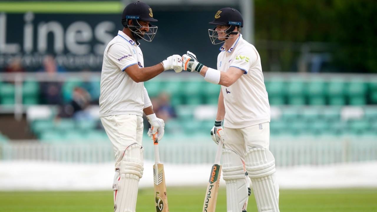 Cheteshwar Pujara and Steven Smith bump fists during their partnership, Worcestershire vs Sussex, County Championship, Division Two, New Road, 2nd day, May 5, 2023