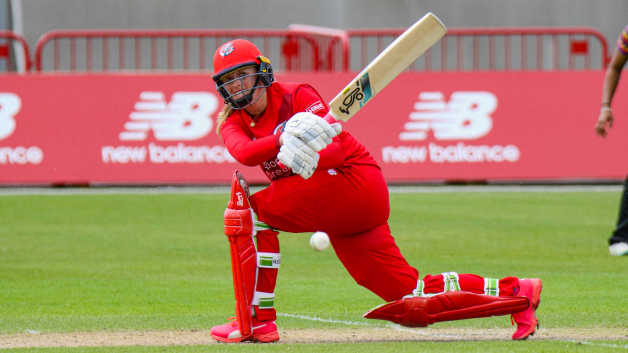 Thunder batter Sophie Ecclestone sweeps a boundary through square leg during her half-century, Thunder v Central Sparks, Rachael Heyhoe Flint Trophy, Manchester, May 6, 2023