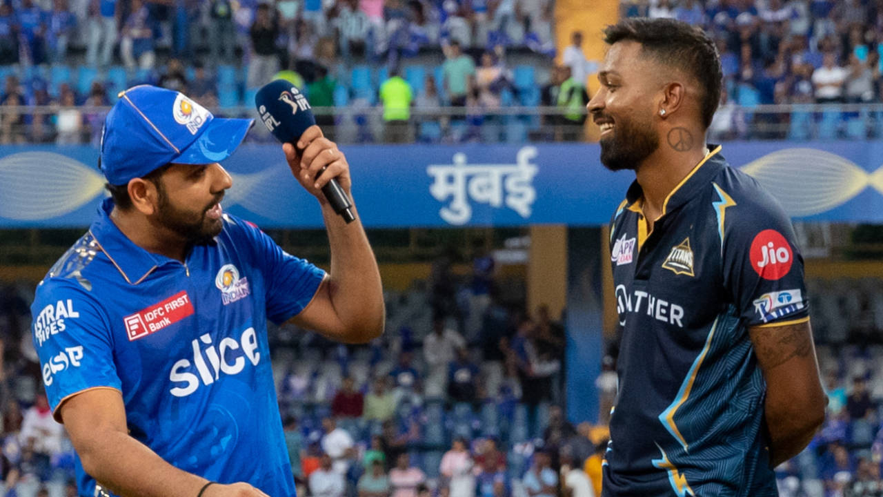 An animated Rohit Sharma and Hardik Pandya catch up at the toss, Mumbai Indians vs Gujarat Titans, IPL 2023, Mumbai, May 12, 2023