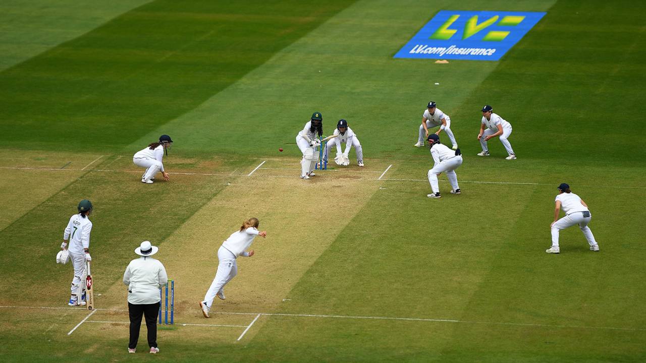 England's close-in fielders surround Tumi Sekhukhune as she faces a ball from Sophie Ecclestone, England vs South Africa, Only Women's Test, Taunton, 4th day, June 30, 2022