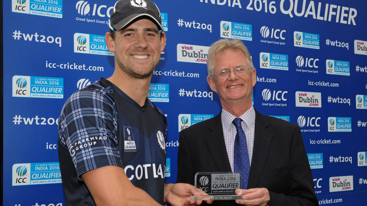 Rob Taylor is presented with his Man of the Match award by Tony Brian, Hong Kong v Scotland, World T20 Qualifier, 1st semi-final, Malahide, July 25, 2015
