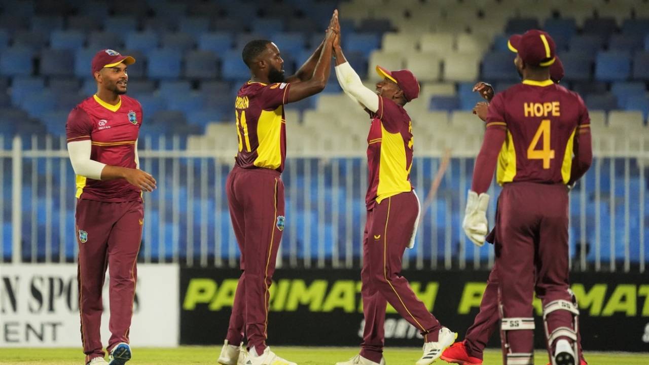 Akeem Jordan celebrates with team-mates on getting Muhammad Waseem, UAE vs West Indies, 2nd ODI, Sharjah, June 6, 2023