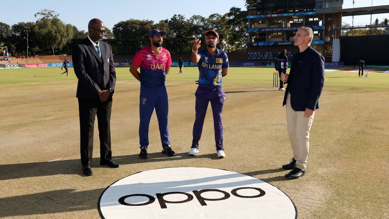Captains Muhammad Waseem and Dasun Shanaka with Match Referee Emmanuel Dube at the toss 