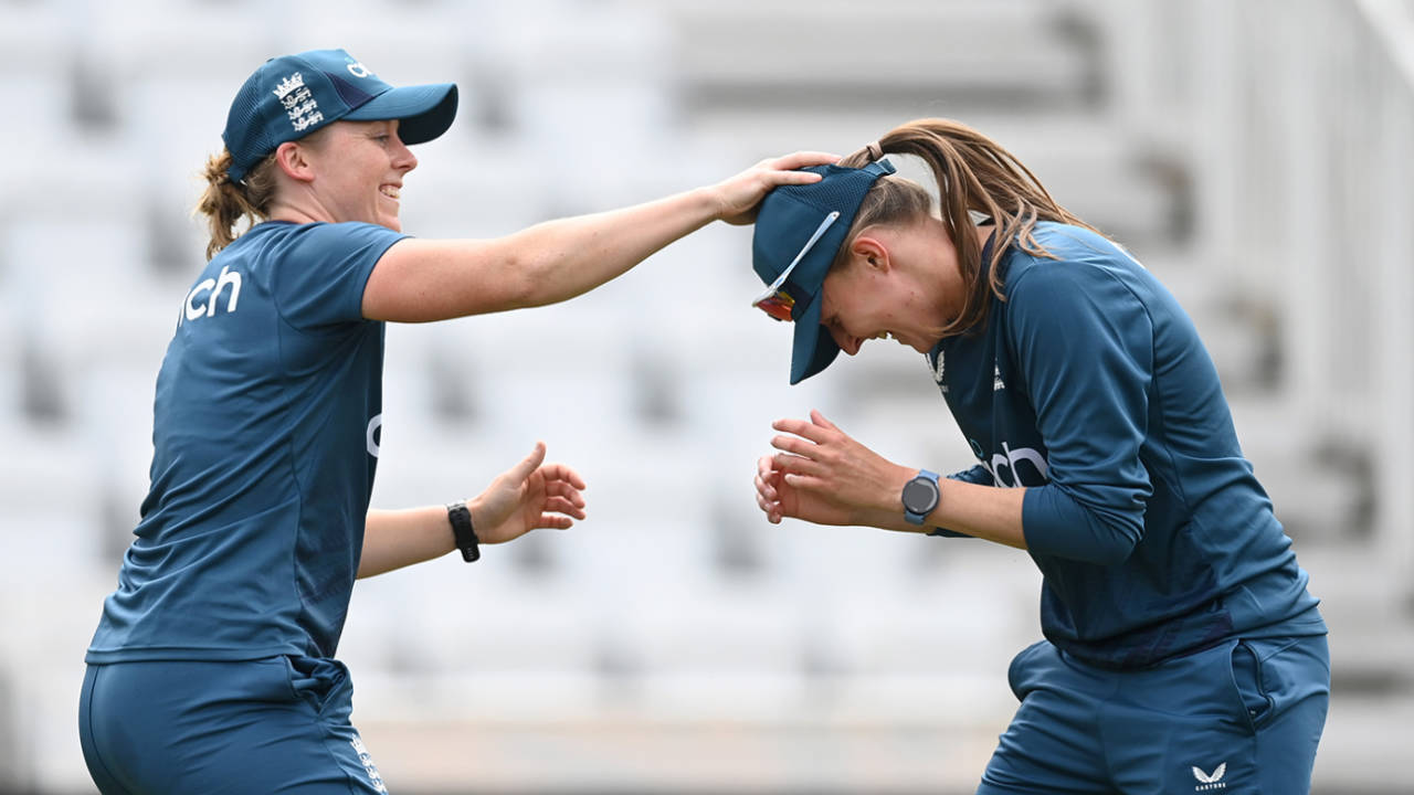 Lauren Filer shares a joke with England captain Heather Knight during a nets session ahead of the Women's Ashes Test, Trent Bridge, June 20, 2023