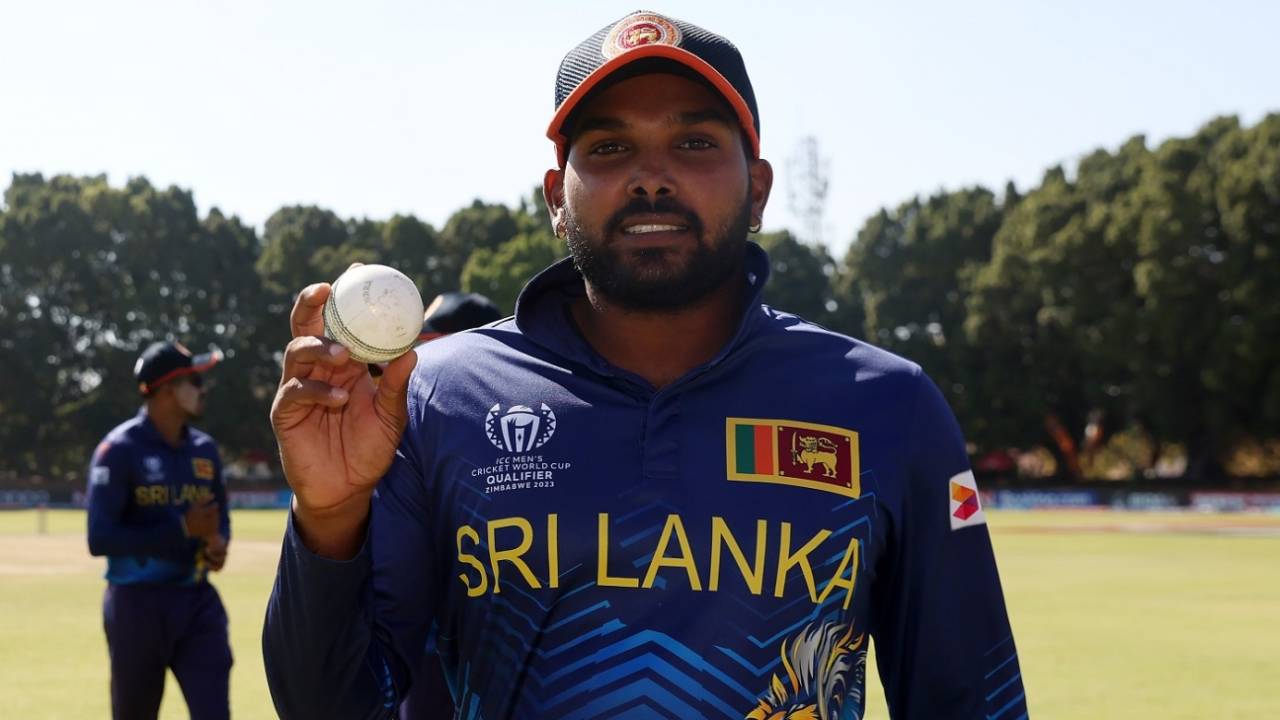 Wanindu Hasaranga holds the ball up after bagging five wickets against Oman, Oman vs Sri Lanka, ICC Cricket World Cup Qualifier, Bulawayo, June 23, 2023