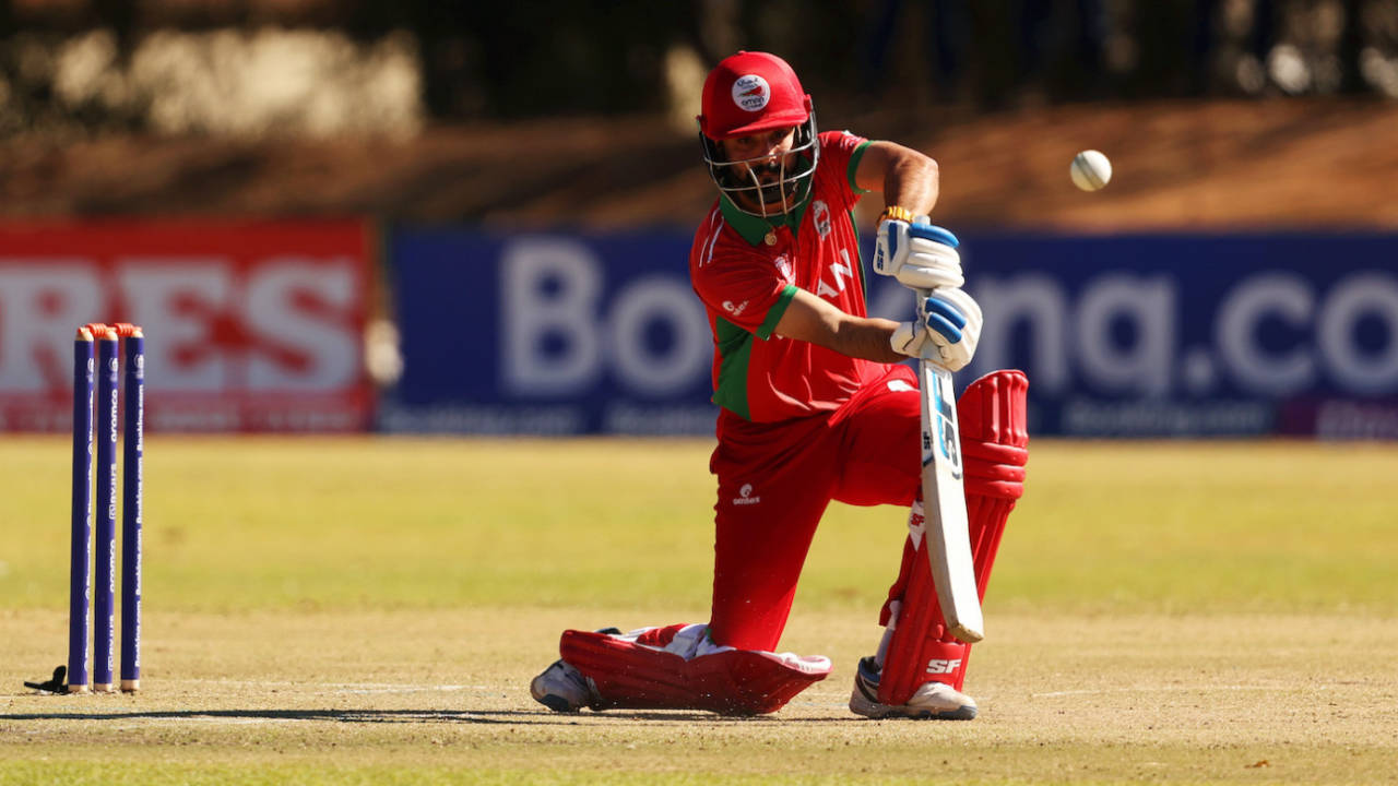 Jatinder Singh gets on one knee for a drive, Oman vs Scotland, ICC Cricket World Cup Qualifier, Bulawayo, June 25, 2023