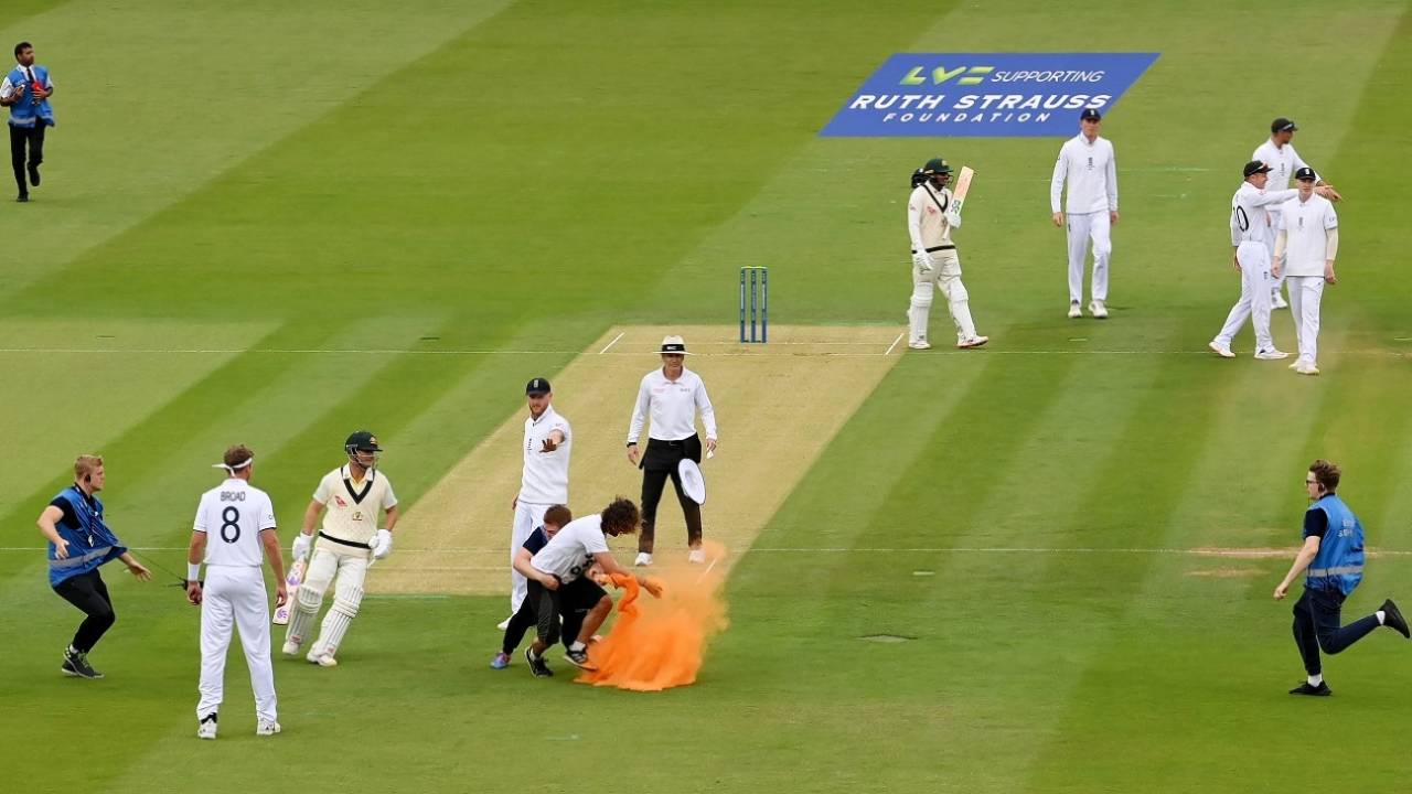 A security personnel tackles a 'Just Stop Oil' pitch invader, England vs Australia, 2nd Ashes Test, Lord's, 1st day, June 28, 2023