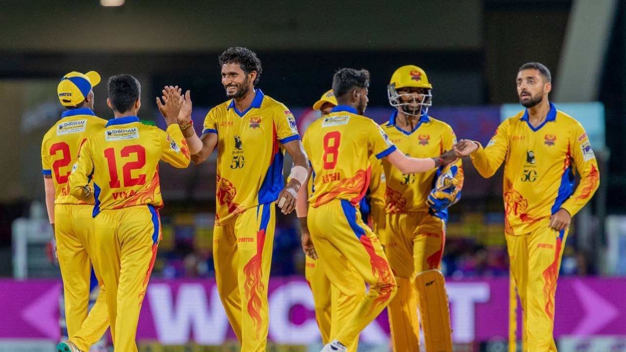Dindigul Dragons' P Saravana Kumar celebrates a wicket with his team-mates