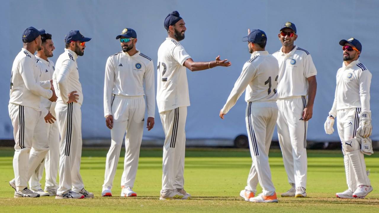 Team-mates surround Baltej Singh after he got a wicket, North Zone vs North East Zone, Duleep Trophy, 3rd day, Bengaluru, June 30, 2023
