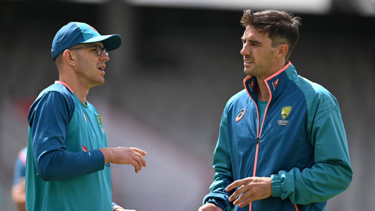 Todd Murphy and Pat Cummins have a chat during training, Manchester, July 17, 2023