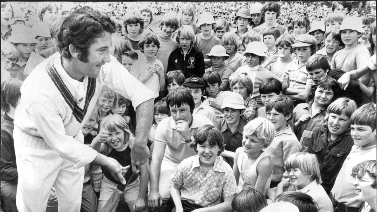 Brian Taber demonstrates a cricket stroke to young cricket fans, Drummoyne Oval, Sydney, October 7, 1973