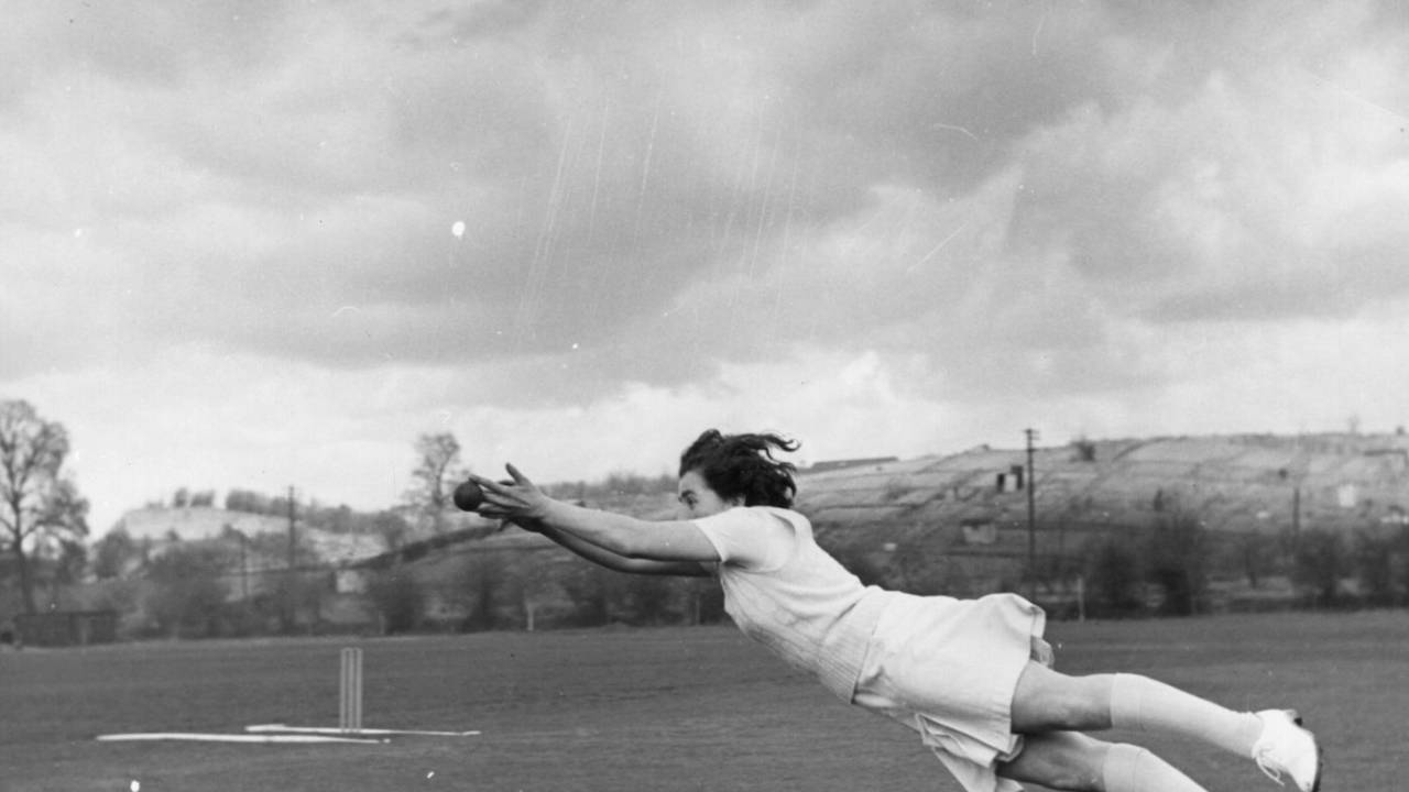 Yorkshire and England women's fast bowler Mary Johnson leaps at full stretch for a catch