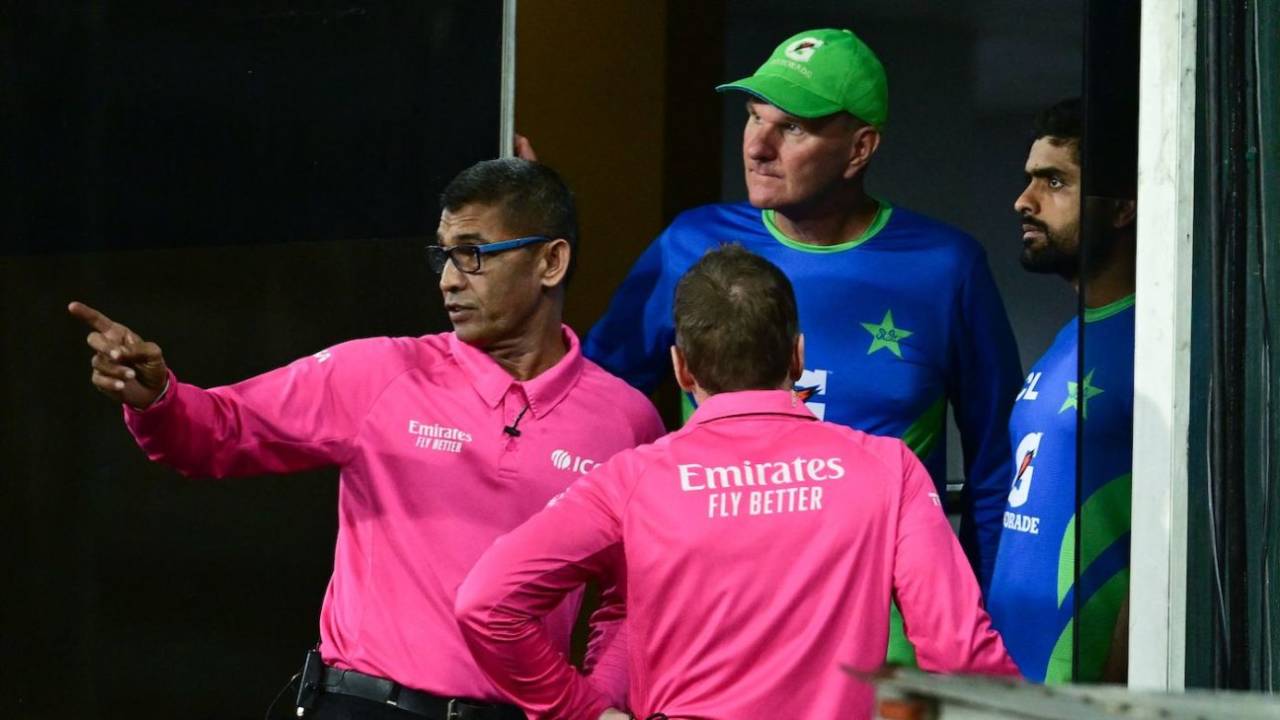 Ruchira Palliyaguruge appears to be pointing out the problem areas on the ground to the Pakistan camp, Pakistan vs India, Asia Cup Super Four, Colombo, September 10, 2023