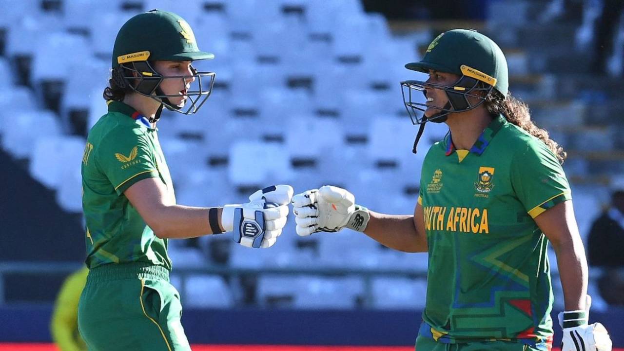 Laura Wolvaardt bumps fists with Chloe Tryon during their partnership, South Africa vs Australia, Women's T20 World Cup, Cape Town, February 26, 2023