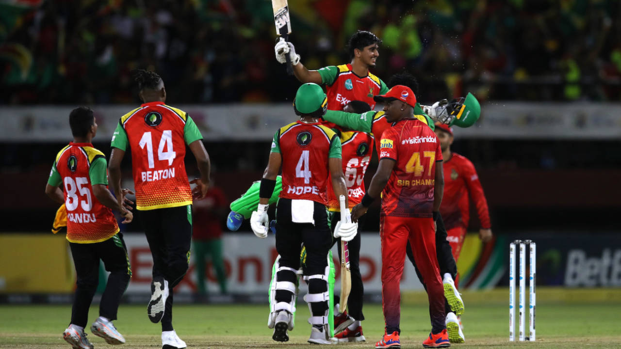 Saim Ayub is lifted by jubilant team-mates after he hit the winning runs, Guyana Amazon Warriors vs Trinbago Knight Riders, CPL 2023, final, Providence, September 24, 2023