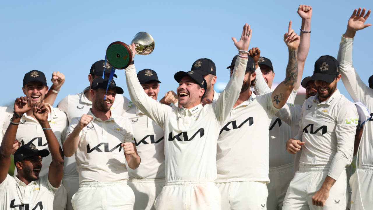 Rory Burns lifts the County Championship trophy after Surrey sealed back-to-back titles&nbsp;&nbsp;&bull;&nbsp;&nbsp;Surrey CCC/Getty Images