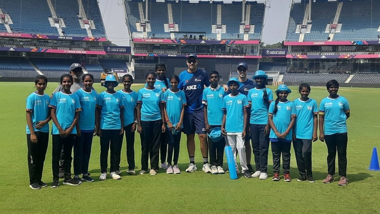 One for the album: Tim Southee and Mark Chapman pose with the kids, Chennai, October 15