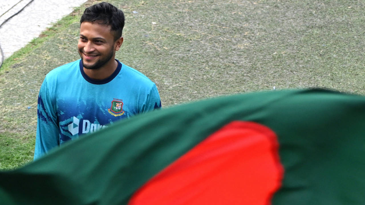 Shakib Al Hasan beams behind the Bangladesh flag, Bangladesh vs Netherlands, Men's ODI World Cup, Kolkata, October 27, 2023