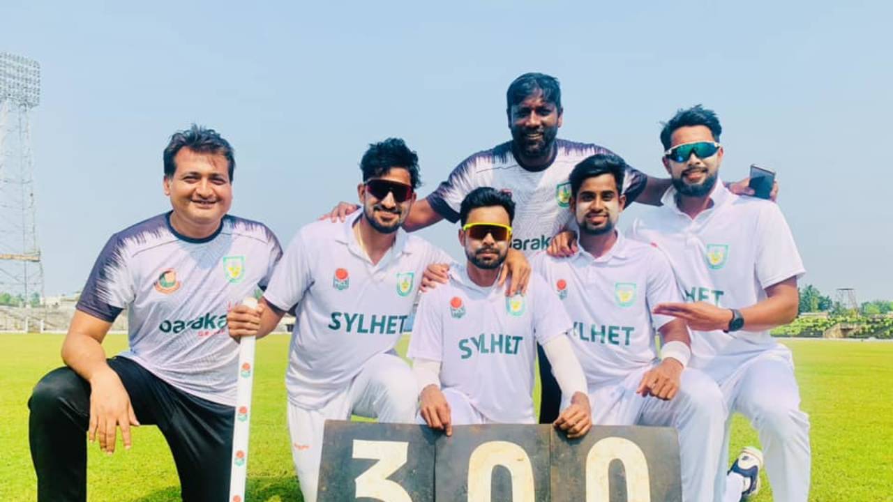 Abu Jayed celebrates his 300th first-class wicket with his team-mates