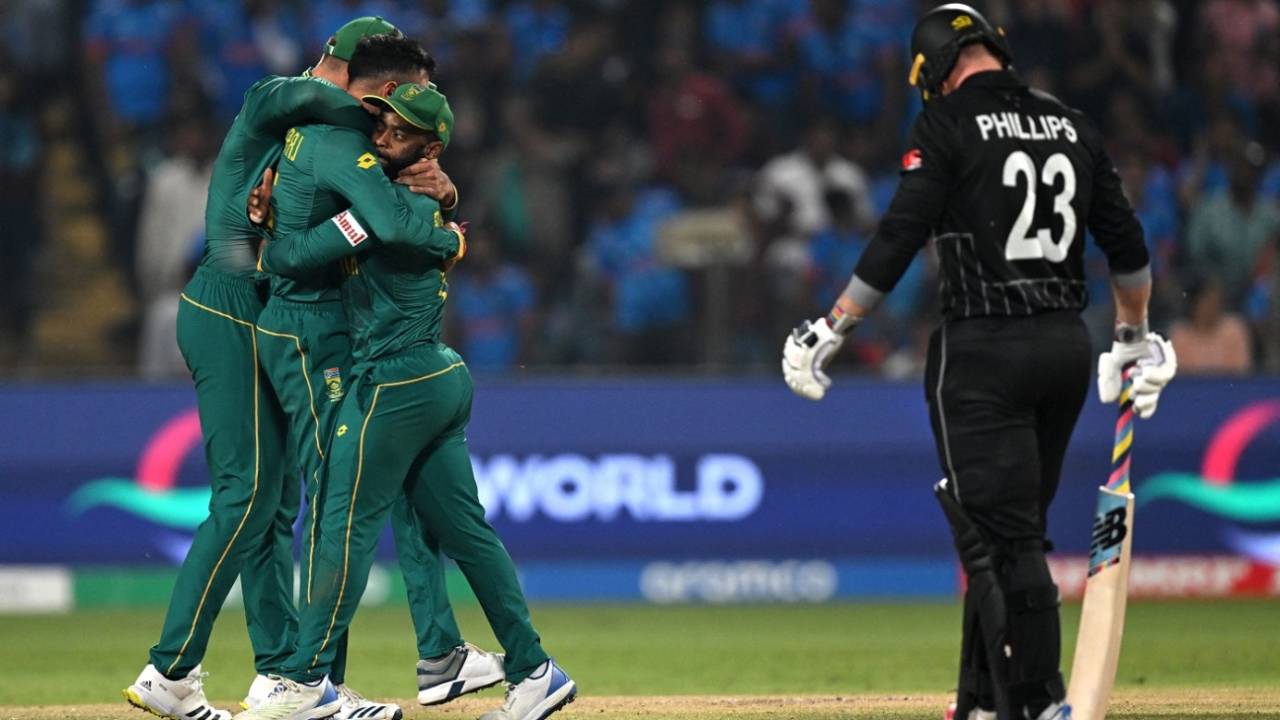 Aiden Markram, Keshav Maharaj and Temba Bavuma celebrate Daryl Mitchell's wicket, New Zealand vs South Africa, ODI World Cup 2023, Pune, November 1, 2023