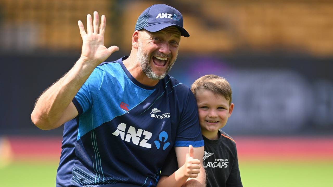 New Zealand bowling coach Shane Jurgensen with his son at a training session