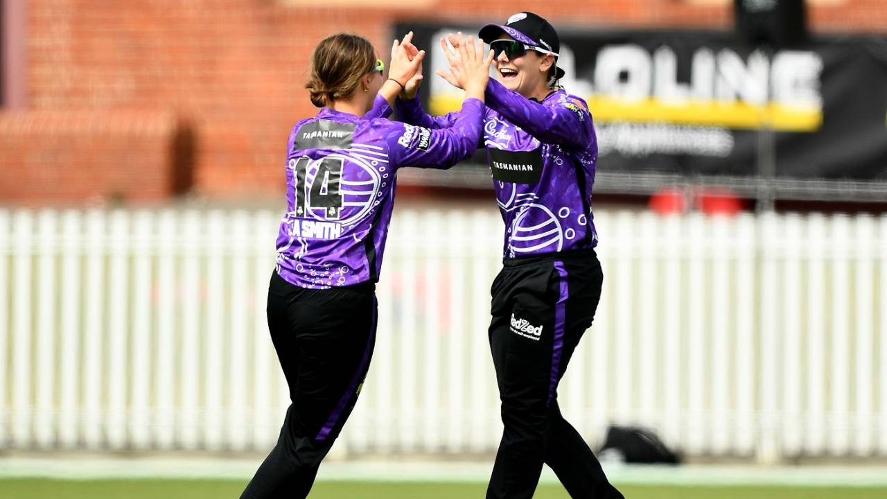 Heather Graham and Amy Smith celebrate the fall of a wicket, Melbourne Renegades vs Hobart Hurricanes, WBBL 2023, Melbourne, November 19, 2023 