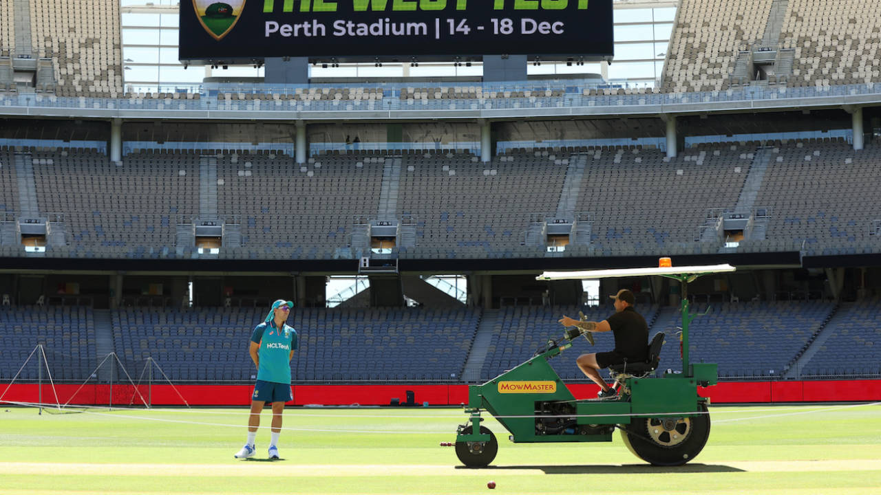 Pat Cummins talks with head curator Isaac McDonald during an Australia nets session, Australia vs Pakistan, 1st Test, Perth, December 12, 2023

