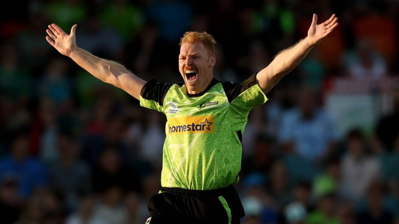 Liam Hatcher celebrates the wicket of Josh Brown, Brisbane Heat vs Sydney Thunder, BBL, Canberra, December 12, 2023